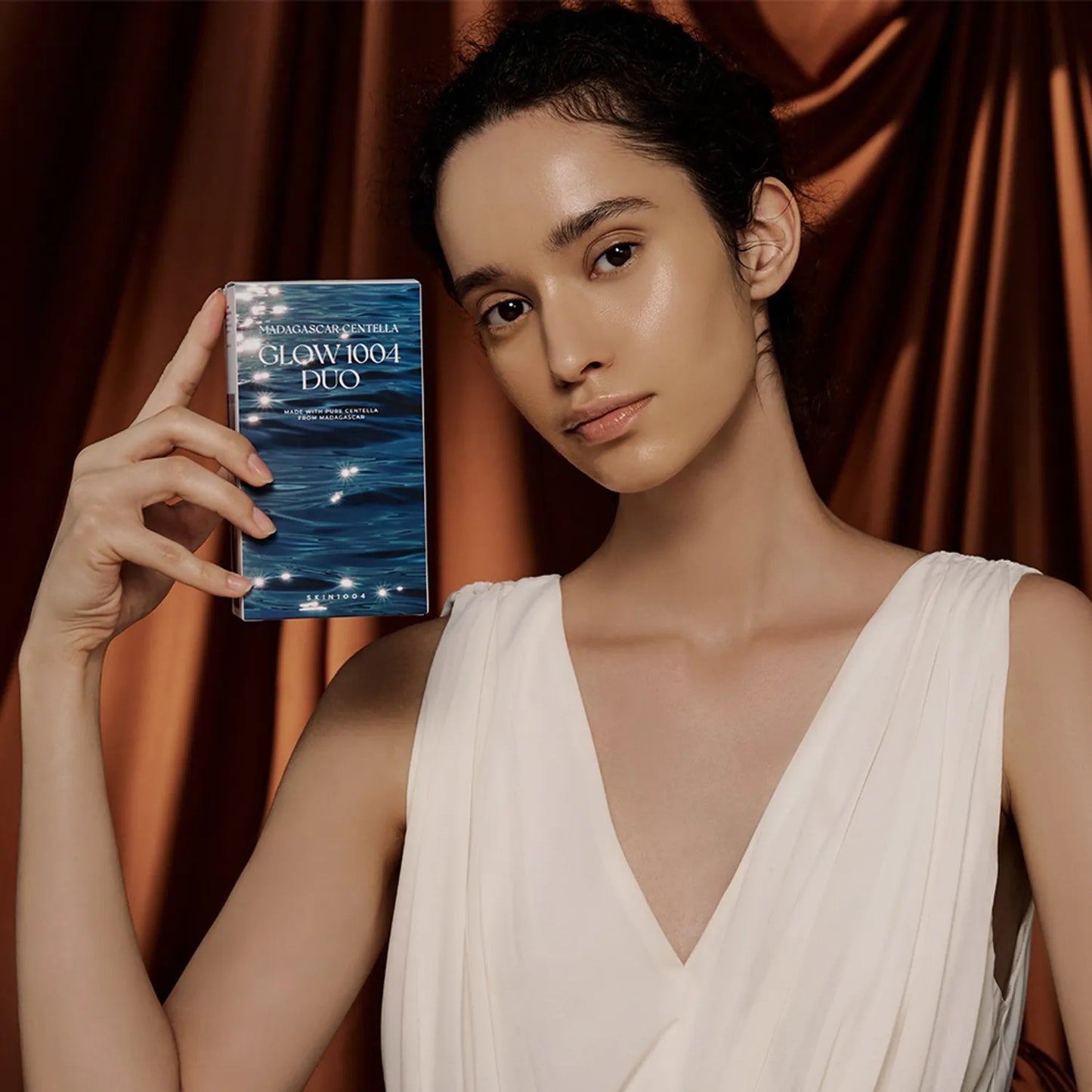 Model holding SKIN1004 Madagascar Centella Glow 1004 Duo Set box - K-Beauty skincare gift set Paphos Cyprus
