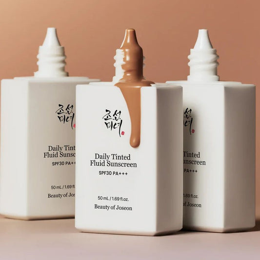  Beauty of Joseon Daily Tinted Fluid Sunscreen MIneral Physical filters zinc oxide, arranged in a row against a warm peach background. No make up look, sun protection, SPF 30 Cyprus, BB Cream with SPF